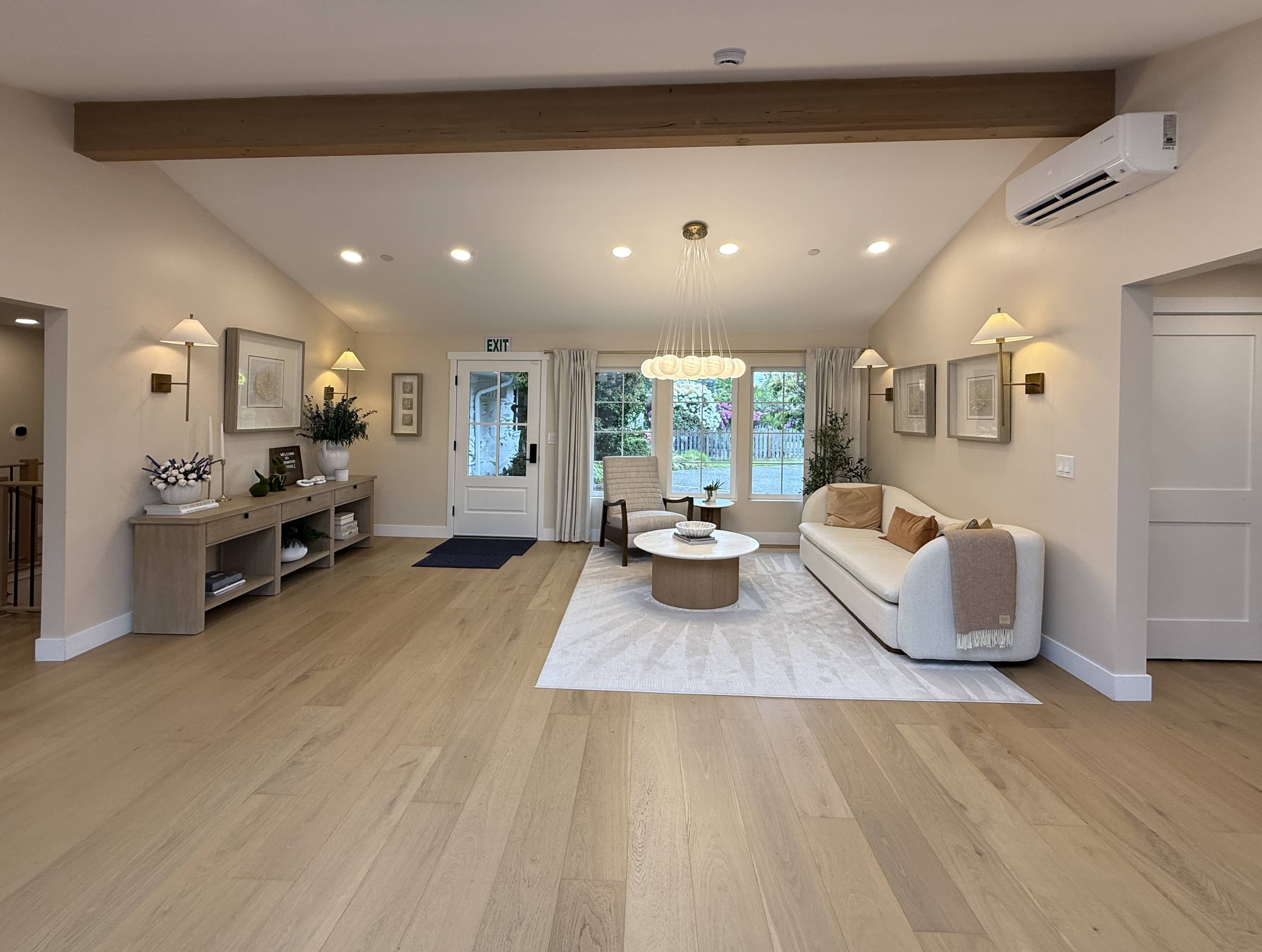 Front entryway with a welcoming porch and warm lighting.